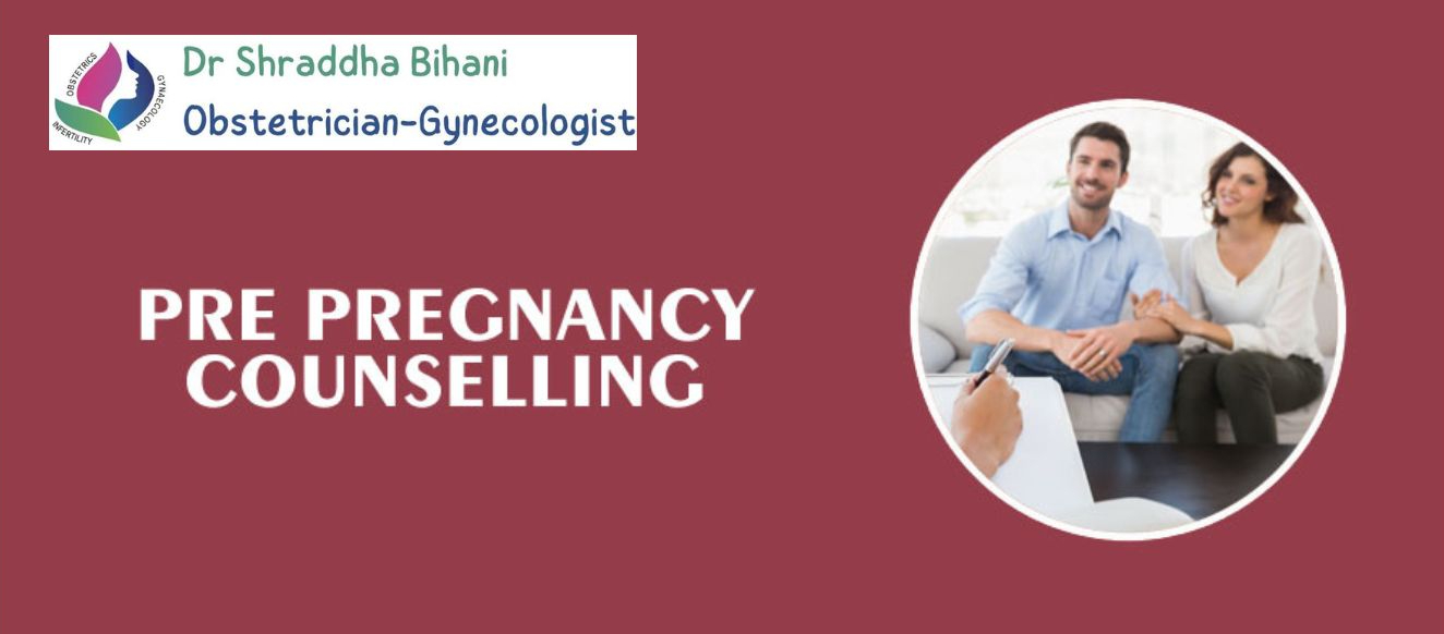 A couple during pre-pregnancy counselling with Dr. Shraddha Bihani, a trusted obstetrician-gynecologist in Indore."